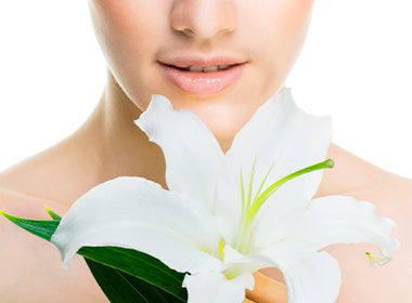 Woman showcasing the benefits of white lily for your skin